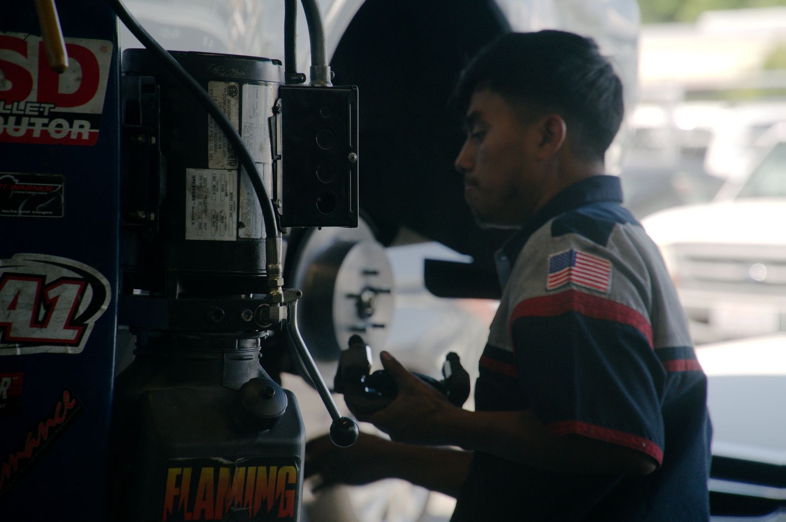 Bay Motors technician resurfacing a brake component